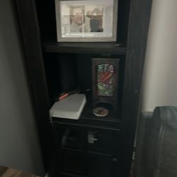 Living Room Entertainment Center With Two Matching Shelves Within Enclosed Storage