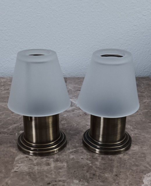 2 Candle holder both $3