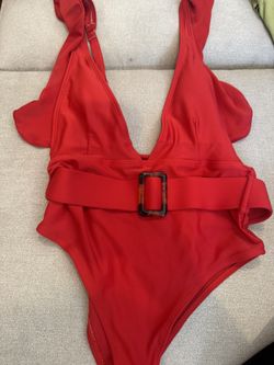 Red one-piece swimsuit with belt