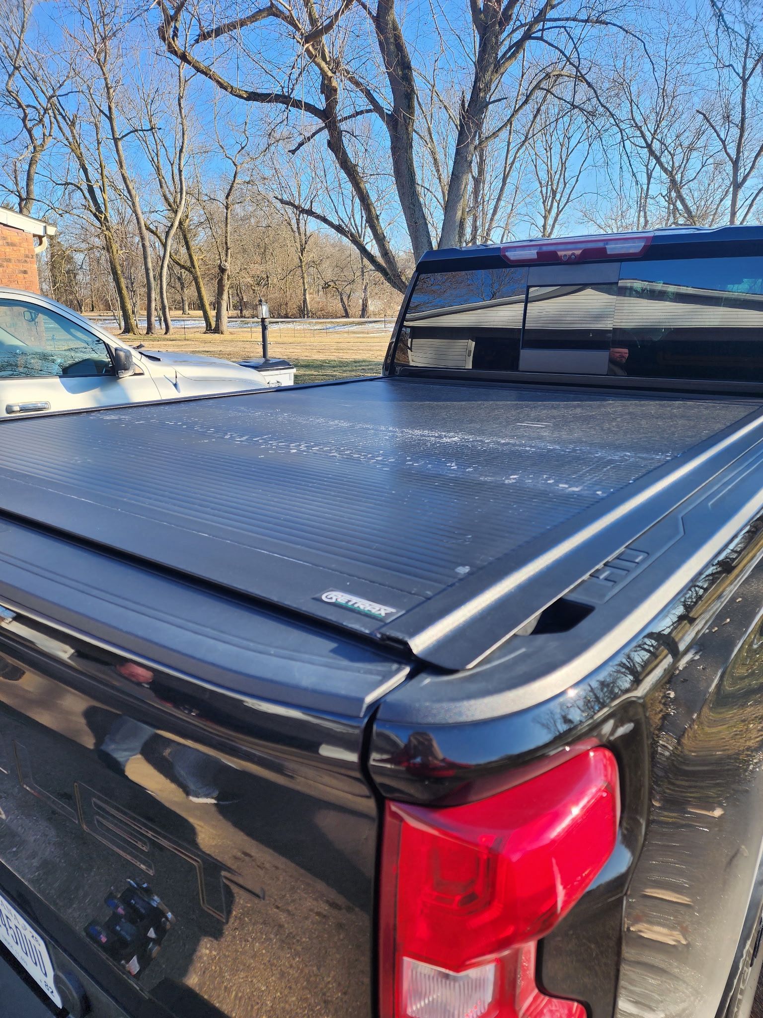 Retrax One MX Manual Retractable Tonneau Cover | RealTruck 6’9 - 2022 Chevy Silverado 3500 