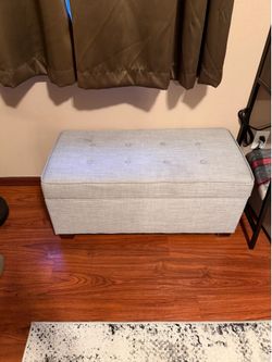 Light grey storage ottoman
