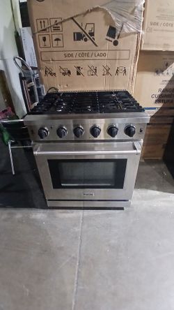 Slide in stainless steel gas range