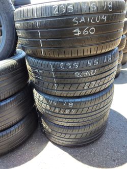 4 good low profile tires size 235-45-18 all 4 for $220 free installation and balance