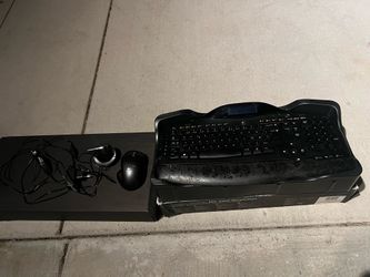 Logitech Cordless Desktop MX 5500 Revolution computer keyboard and mouse set.
