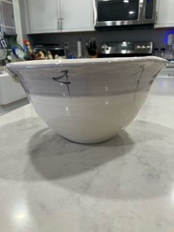 Ceramic bowl with spout and small handle