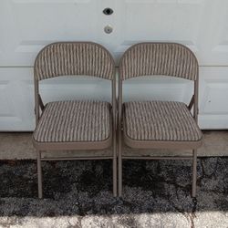 2  Folding Metal Padded Chairs 