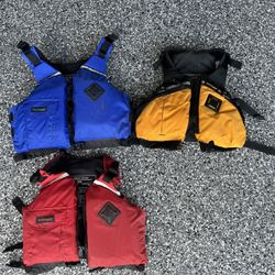 2 Youth Size: Stohlquist Life Jackets. (blue One Sold)
