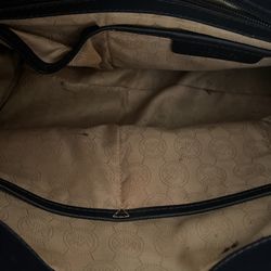 Inside Of The Blue Michael Kors Bag 