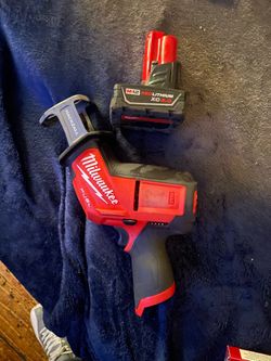 Milwaukee m12 fuel brushless hackzal with red lithium xc4.0 battery