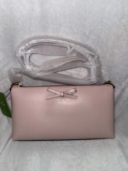 Light pink Kate Spade bow crossbody