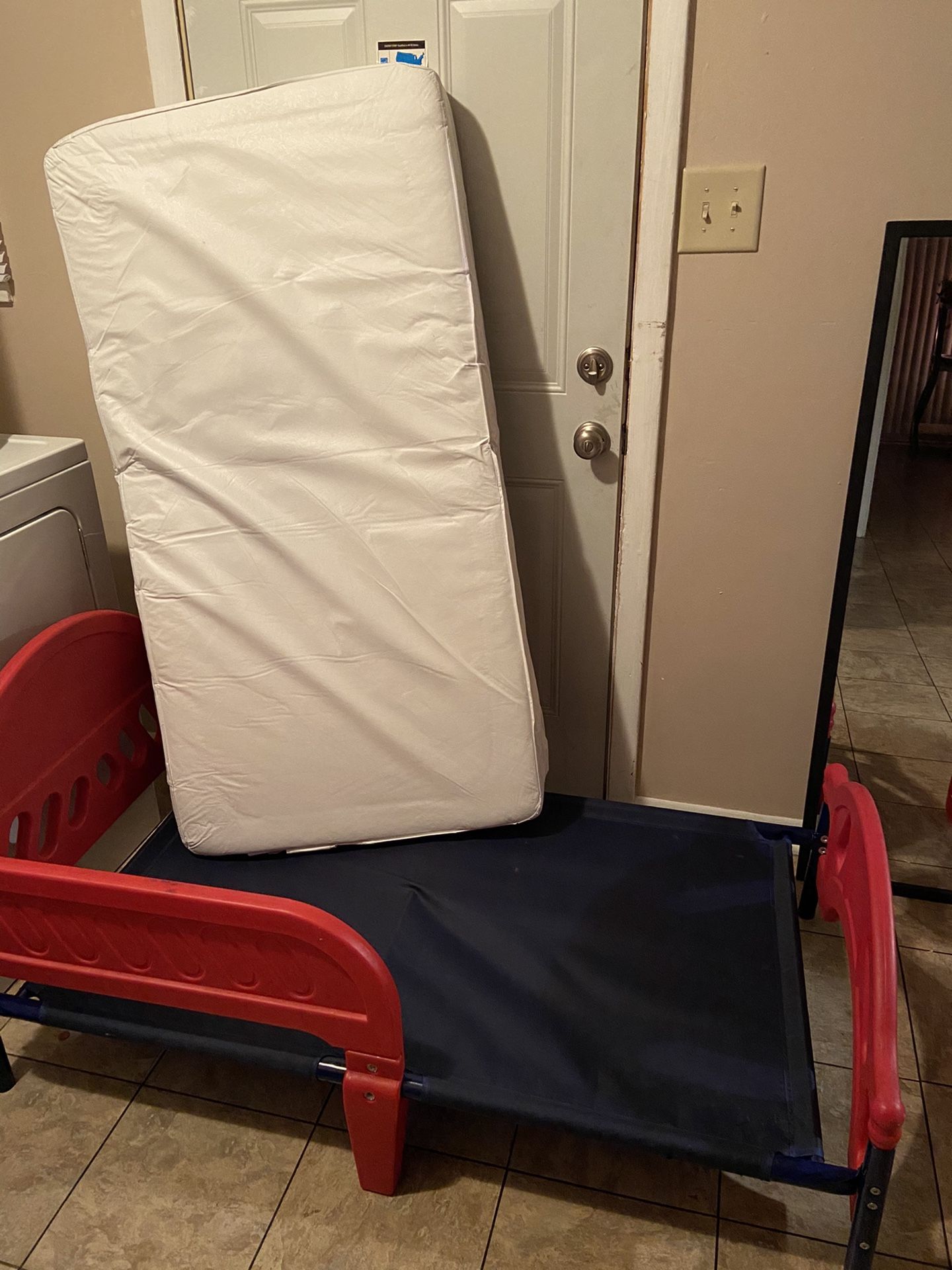 Toddler Bed frame and mattress (not used)