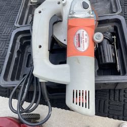 Electric concrete saw working