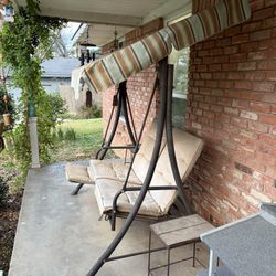 Porch Glider With Awning And Pull Out Rest 