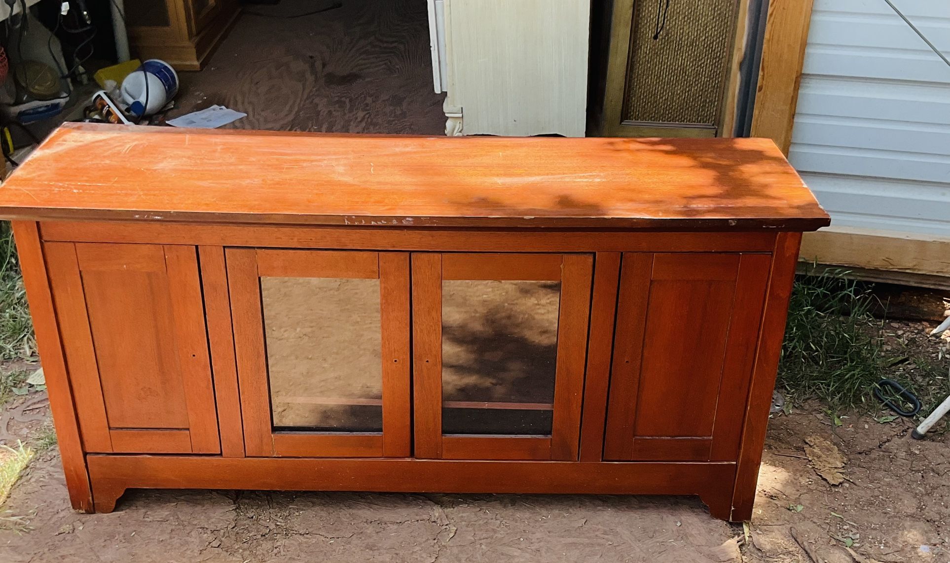 Tv stand that needs some TLC it’s 25 inches tall 53 inches wide and 16 inches deep