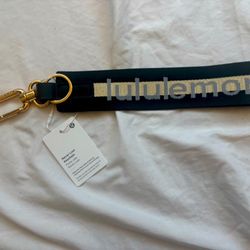 Lululemon Black And Gold Never Lost Keychain Brand New