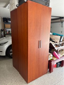 Oak like cabinet good for closet