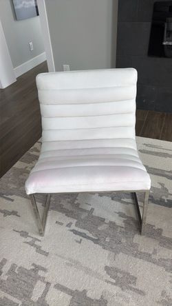 2 White Armless Faux leather Chairs