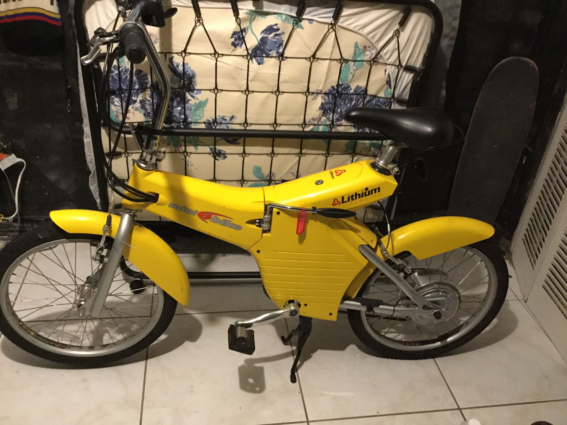 Mini ebike yellow it folds and also pedals so I can be electric or real bike I didn’t have the charger for it so I don’t kno if it needs new battery