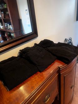 Ladies 8 pairs of size 14 black jeans $7.00 takes all