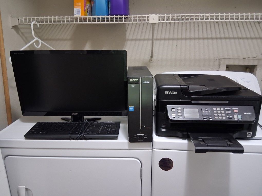 computer with keyboard, screen, and printer