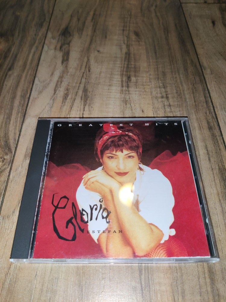 Gloria Estefan : Greatest Hits Latin Pop/Rock 1 Disc CD. Has some wear from age and use. Sold as is.