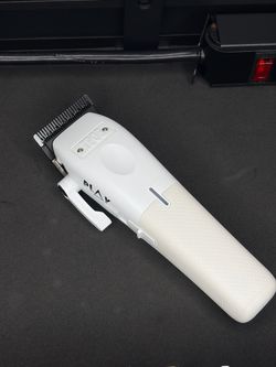 white TPOB PLAY clipper w/ PLAY blade