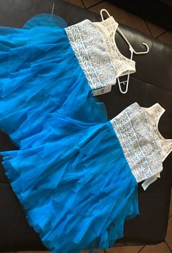 Matching blue dresses brand new with tag!