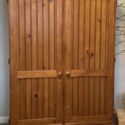 Lodge-style Solid Pine Entertainment Armoire, likely dating from the late 1990s to early 2000s. Its