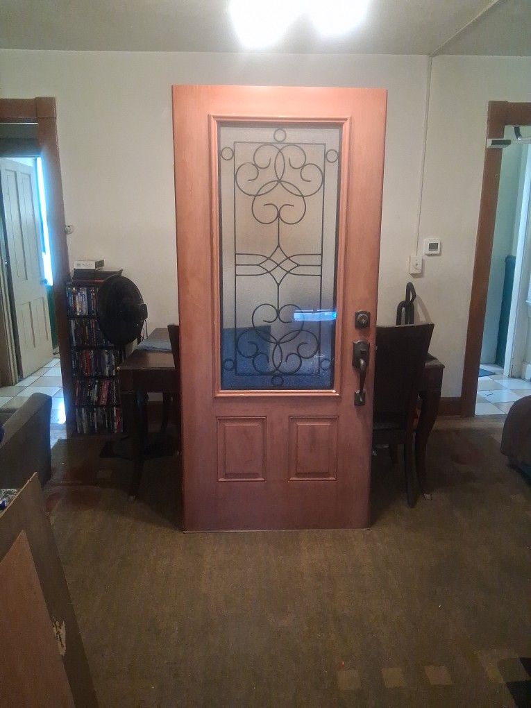 Therma Tru Entrance Door. Fiberglass With Frosted Glass And Wrought Iron "Salinas Style" Design. Classic Mahogany Finish. 36"x79.5".