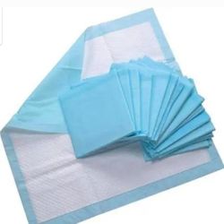 BRAND NEW BOXES OF BED 🛏️ PADS OR DOG🐕PADS,....IM  SELLING WHOLE BOX...w/15 packs in it