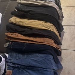 Pants , Shirts , Sweater , Pair Of Shoes