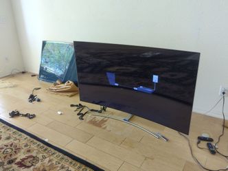 3 large screen TVs