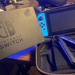 Nintendo switch with neon blue and neon red joy-con