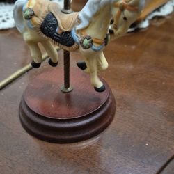 This is a Flambro carousel horse figurine. 