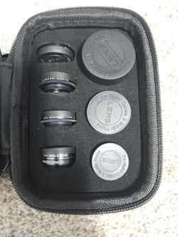 universal cell phone camera lens kit featuring multiple attachment lenses and a protective carrying case.