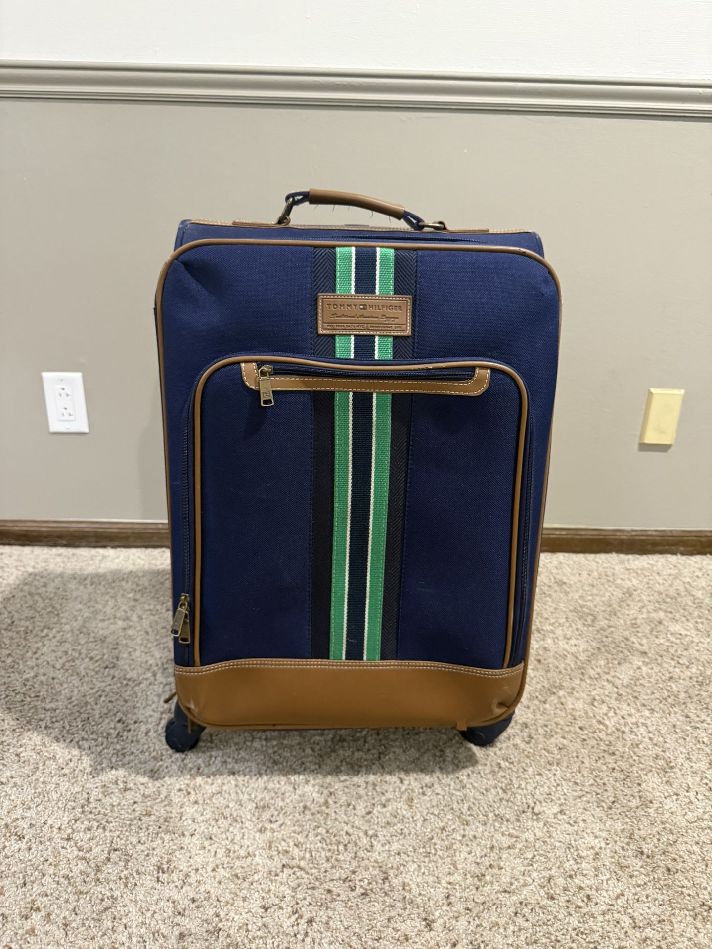 Medium Checked Luggage - $25