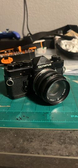 Olympus OM 1 SLR Film Camera with 50mm f/1.8 Lens