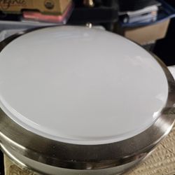 Brand new  ceiling light, doesn't  come with round corcle bulb.