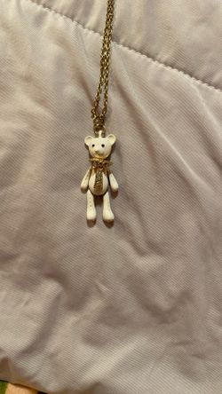 Teddy Bear Necklace With A Diamond Bow