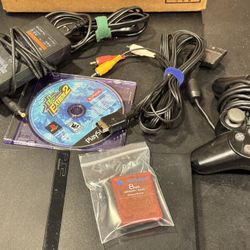 PlayStation 2 slim model SCPH-70001 with controller, memory cards, cables & game.    Tested and working well!