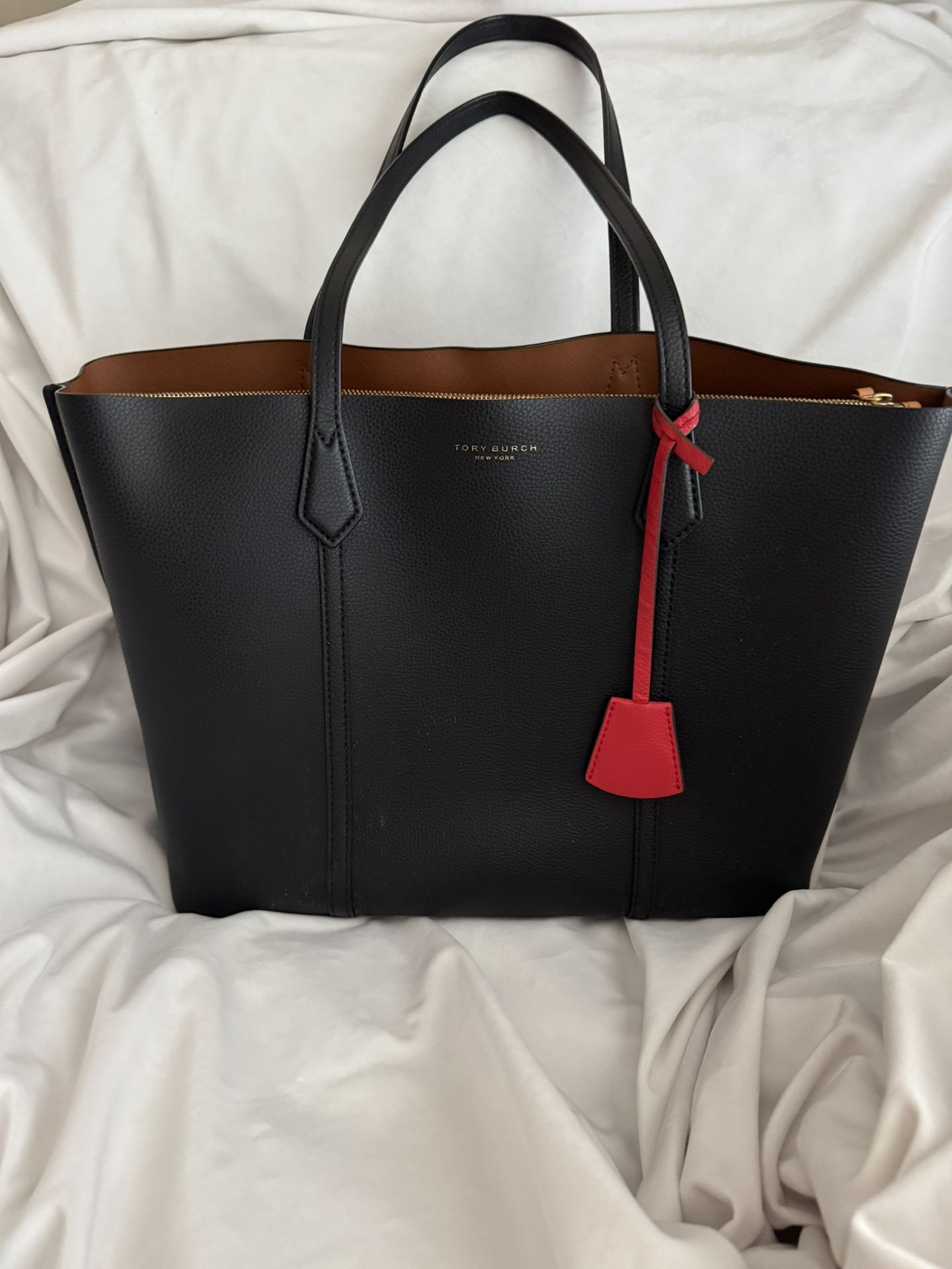 Tory Burch Black  Tote Bag With Red charm. 