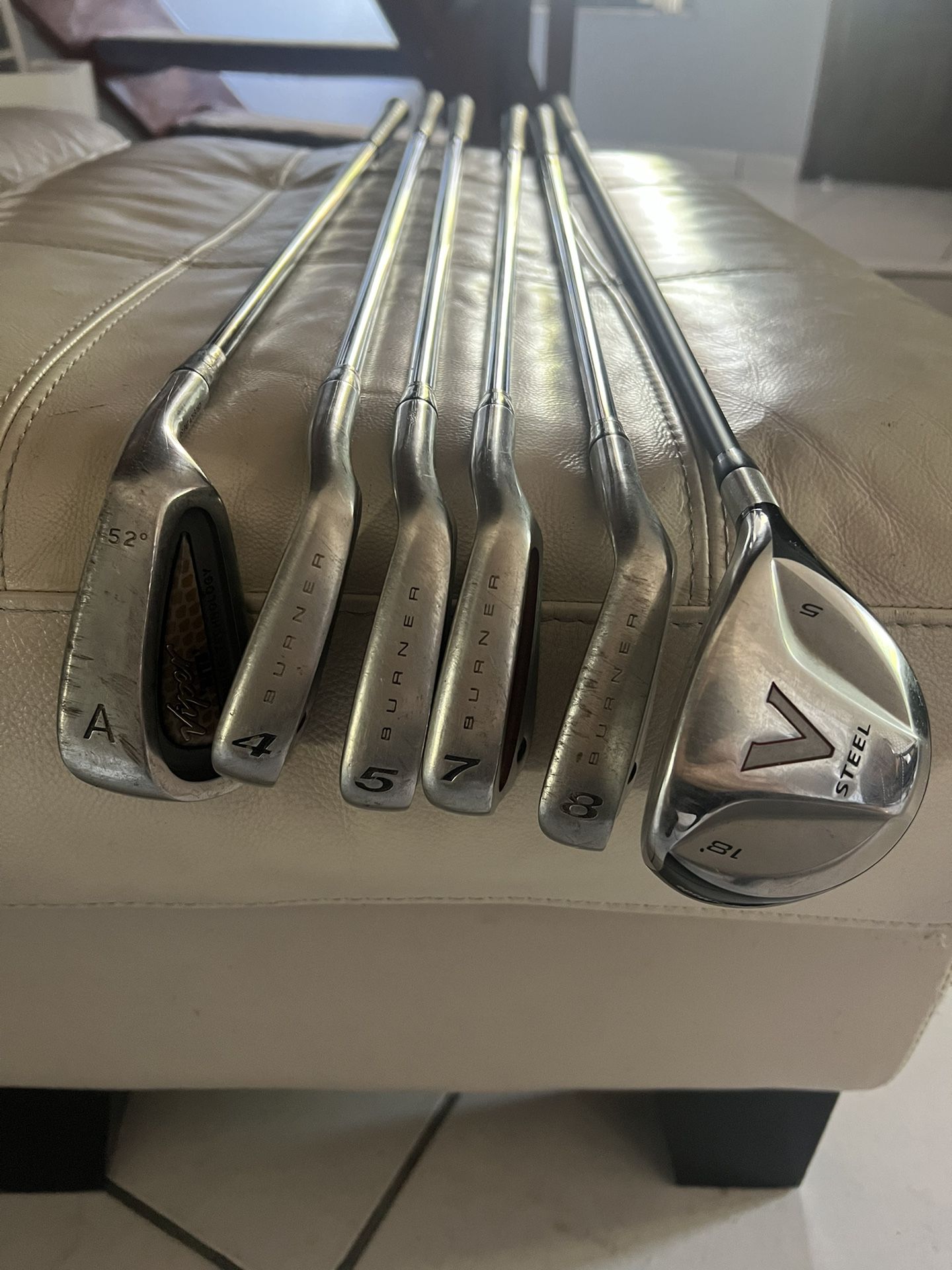 Assorted Golf Clubs Taylor Made Burner Irons, Viper Wedge 52 Degree, Taylor Made V Steel Fairway Wood 5  