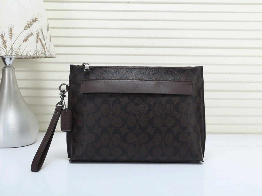 Coach Carry All Pouch In Signature Canvas Women's