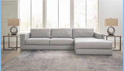 Genuine leather sectional by Ashley
