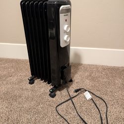 Oil-Filled electric space heater with thermostat
