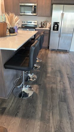 Four Black Stools