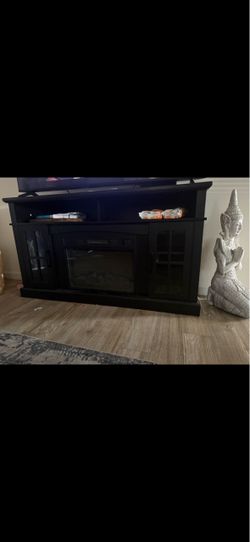 Tv stand with fireplace