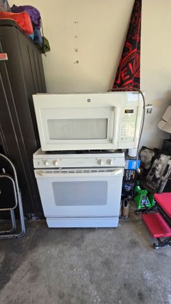 Microwave head range and stove