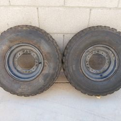 Polaris sportsmen rims and tires 22x7-10--- 4x156