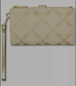 Brand new with tags michael kors wallet and wristlet.